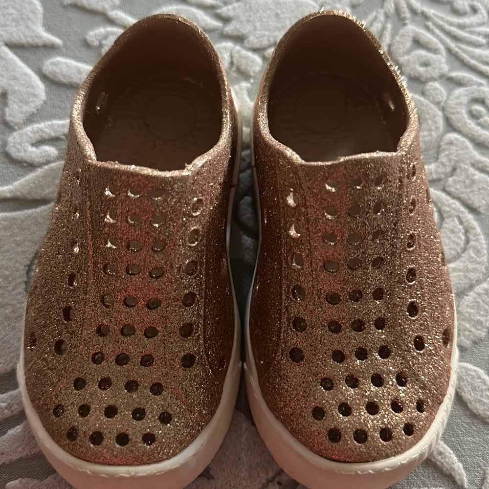 Gold slip on shoes